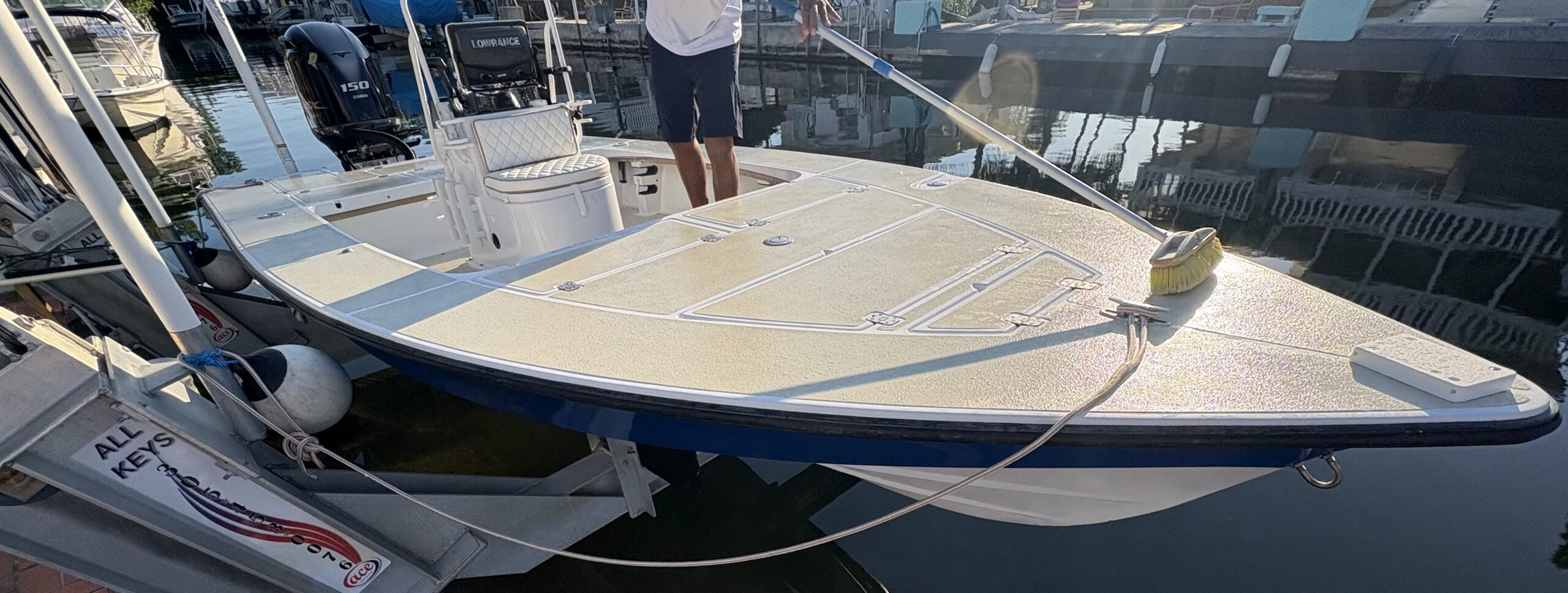 Center console receiving dockside washdown in the Florida Keys