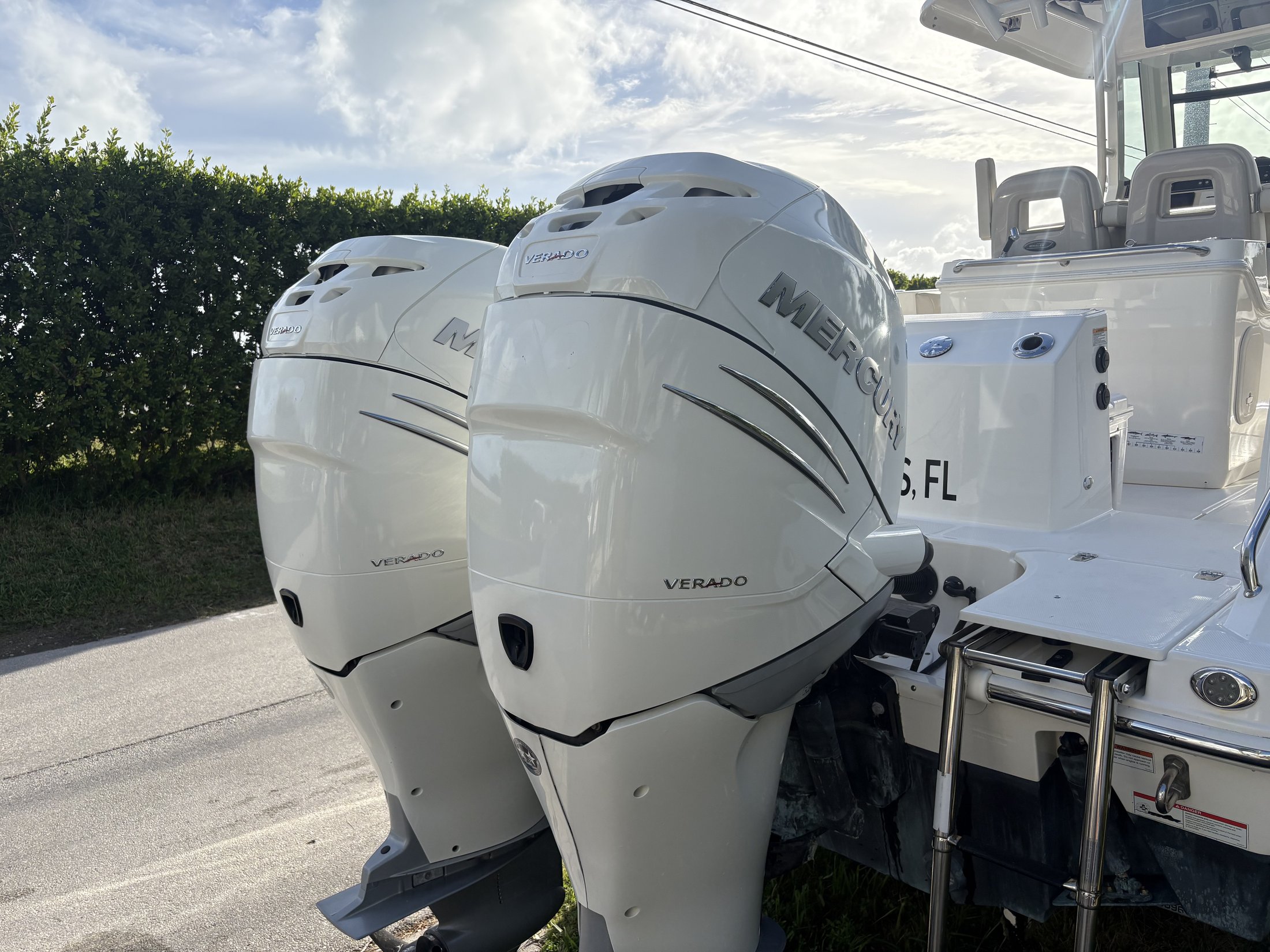 Triple-outboard center console at the dock