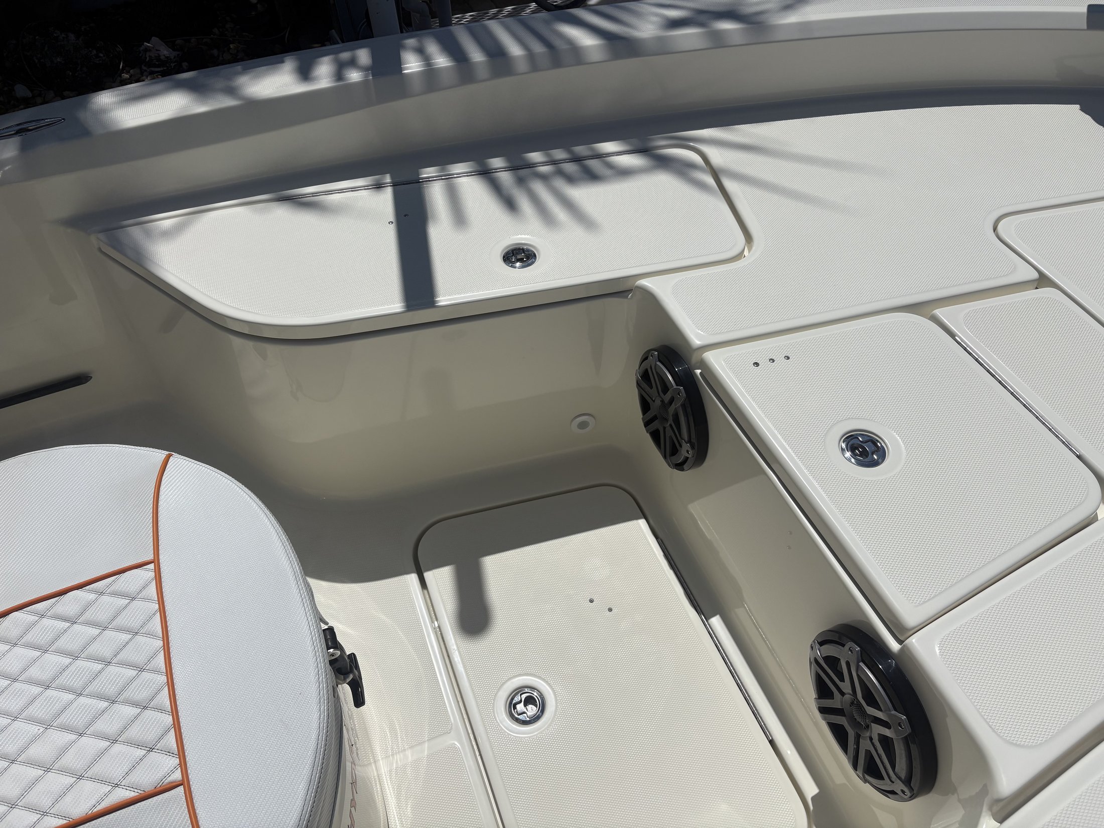 Clean center-console cockpit and seating