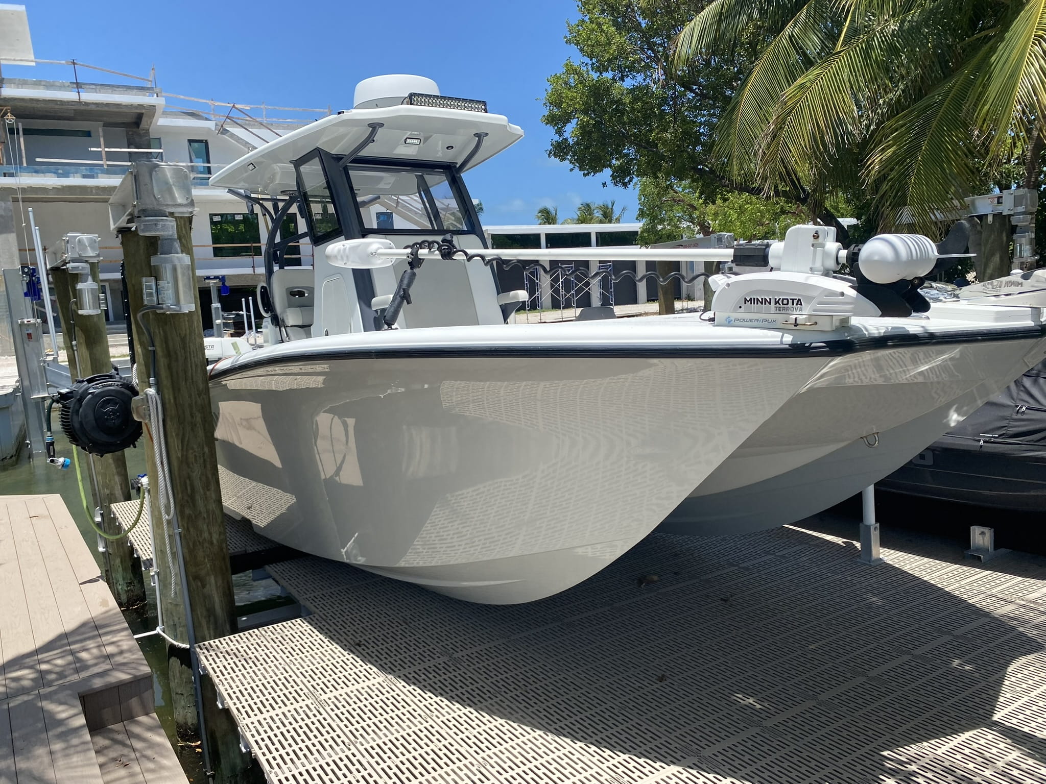 Mirror-gloss center console hull after gelcoat correction in the Keys